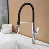 Polished chrome kitchen faucet with black flexible hose running stream water into sink