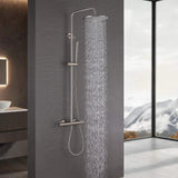 Brushed nickel thermostatic rain shower system delivering wide overhead water coverage