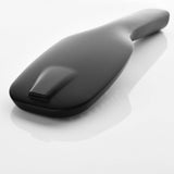 Rear jet spray outlet on a matte black handheld shower head