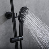 Matte black handheld shower head spraying water beside the adjustable shower rail