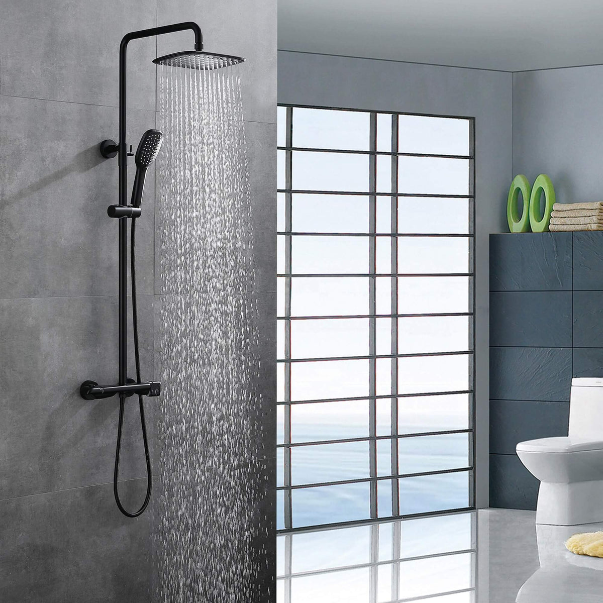 Wall-mounted matte black rainfall shower system running with thermostatic mixer and handheld shower