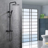 Wall-mounted matte black rainfall shower system running with thermostatic mixer and handheld shower