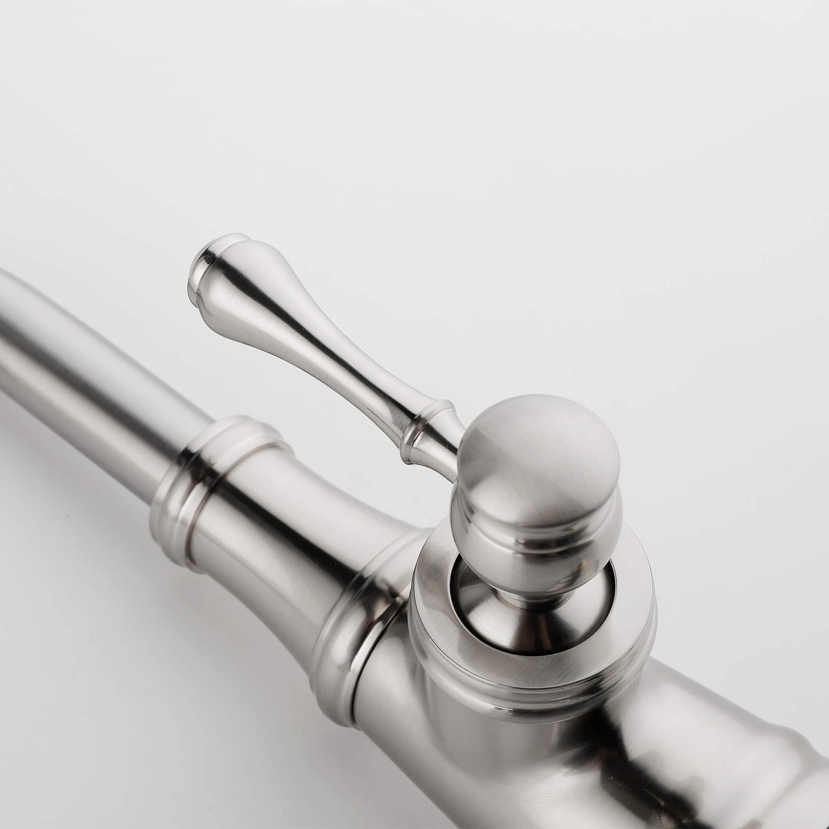 Single handle bathroom faucet lever detail with brushed nickel finish
