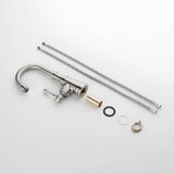 Single hole bathroom faucet components including mounting hardware and supply hoses