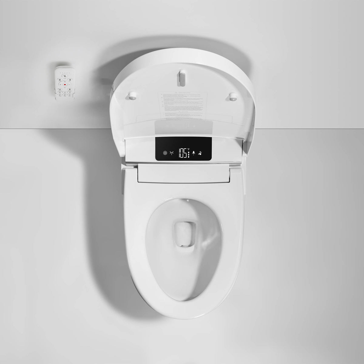 Smart toilet with open lid, bidet seat, digital display and remote control