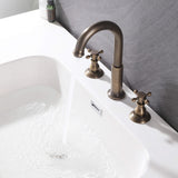 Tall arched spout bathroom faucet with separate cross handles in a vintage finish
