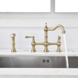 Two handle brushed gold bridge kitchen faucet with side spray and running water