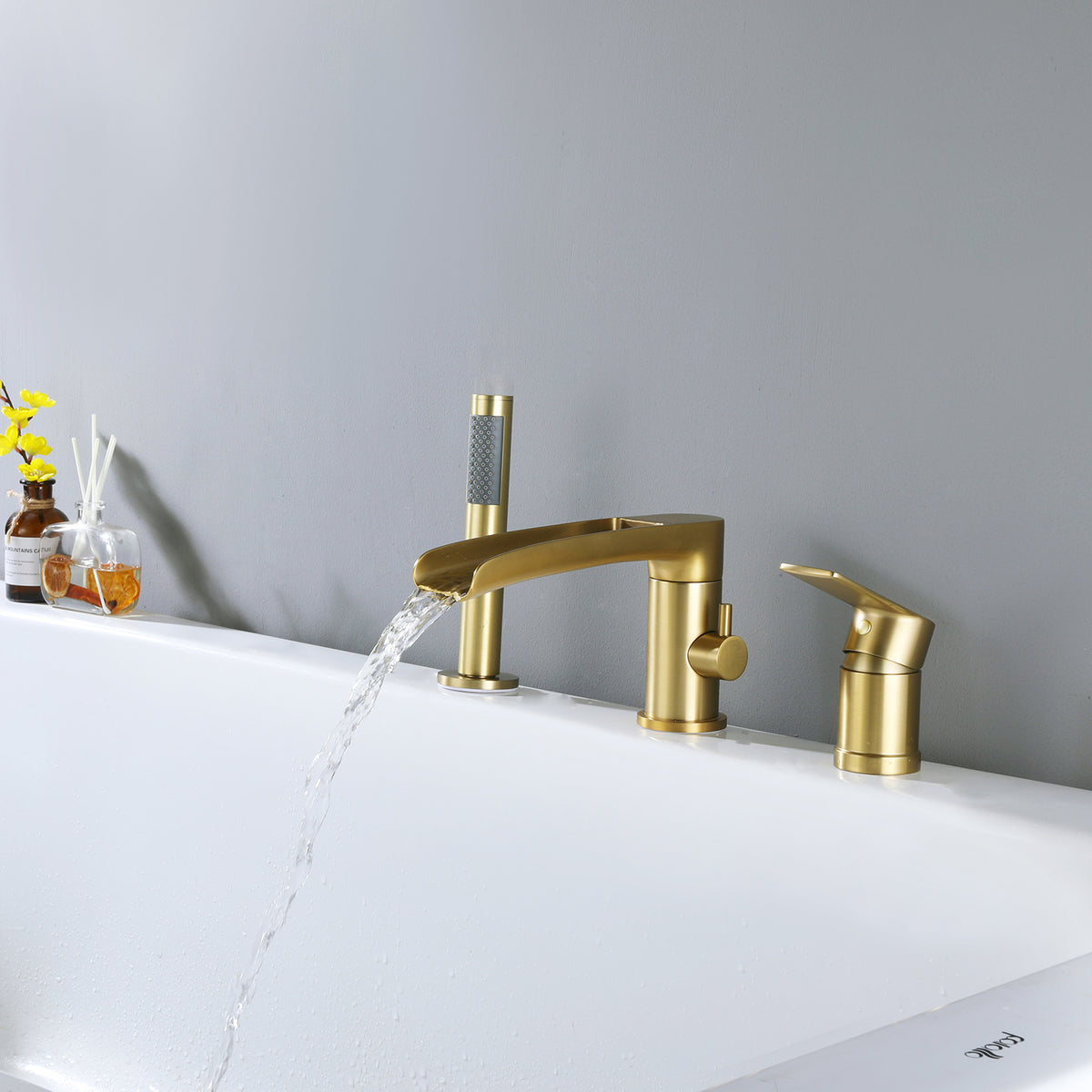 Deck-Mounted Roman Tub Faucet with Waterfall Spout and Handheld Shower